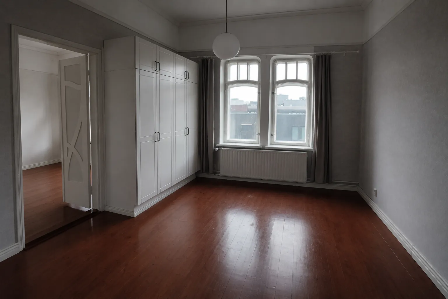 Clean bedroom prepared for property handover in Tampere